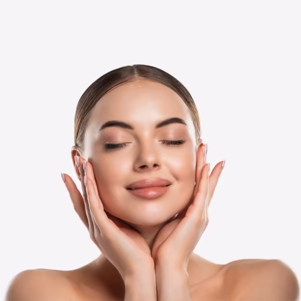 Woman gently touching her face after professional filler dissolving treatment in Scottsdale